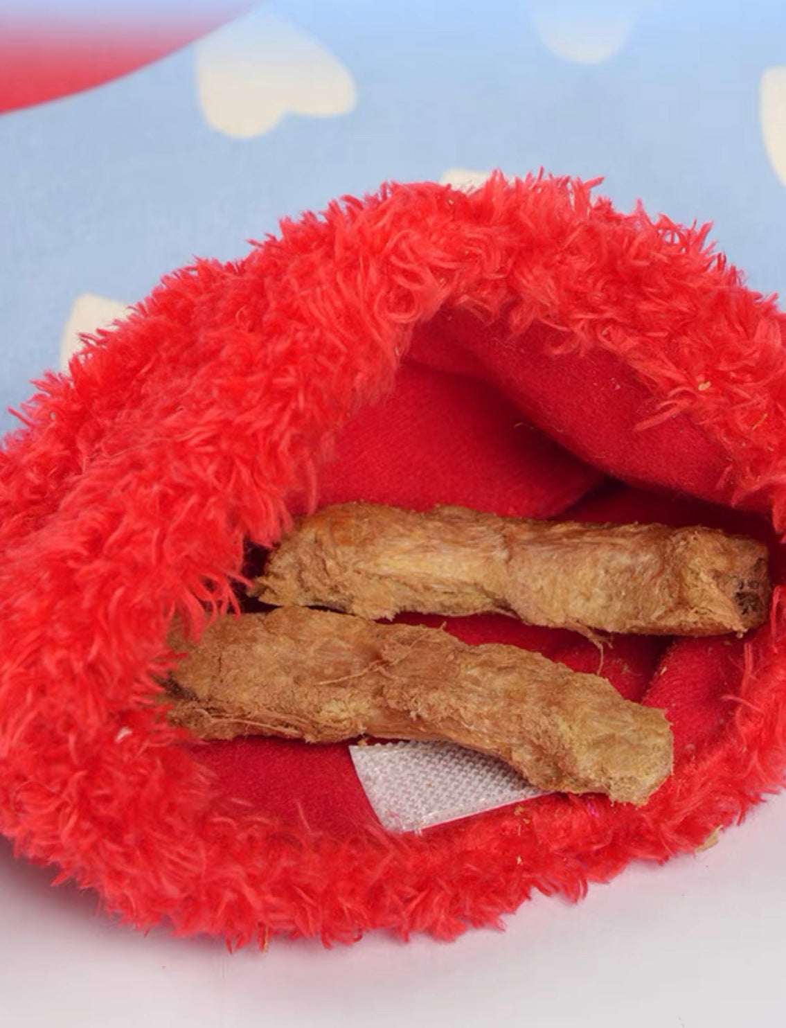 Sock shaped sniffing toy